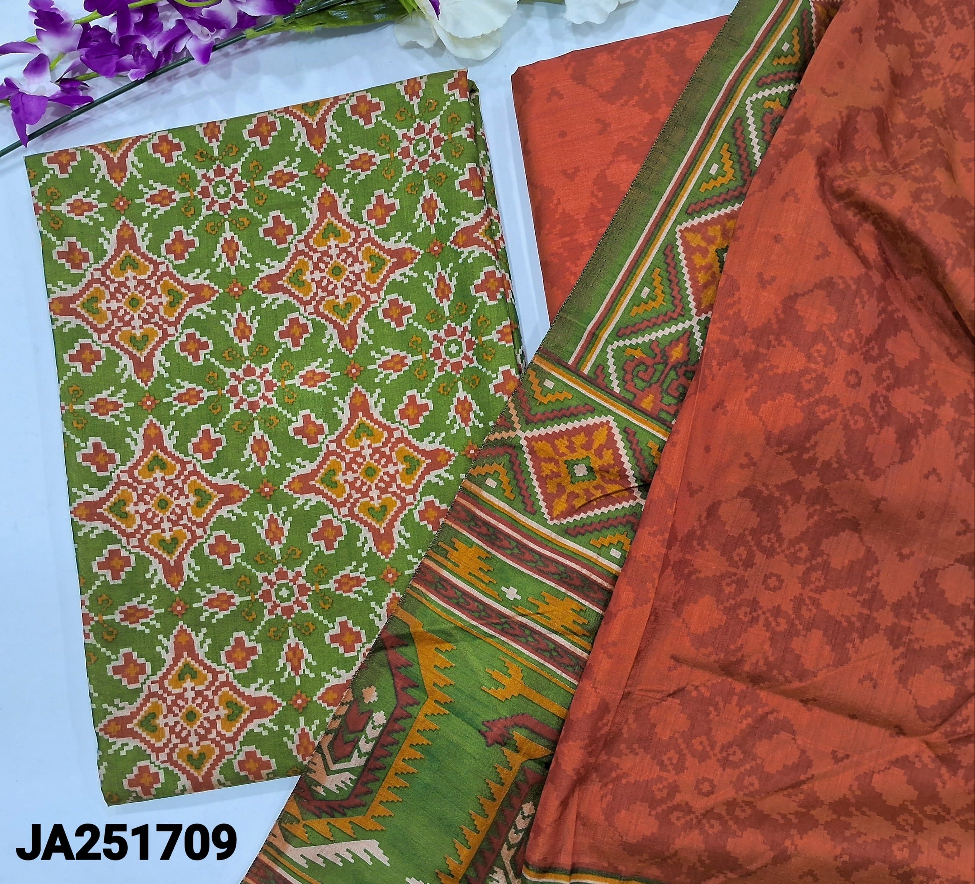 CODE JA251709: Light green ikat printed fancy silk unstitched salwar material(lining needed)brick red sobar patola