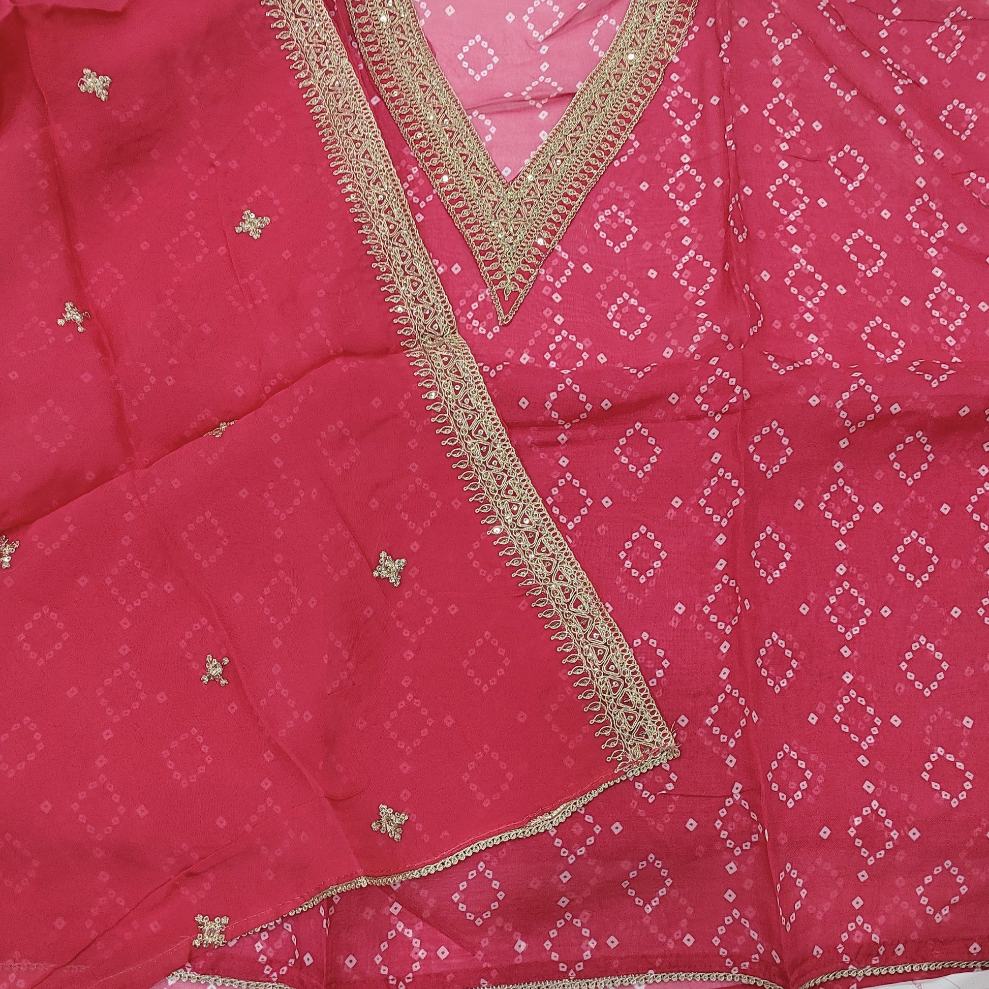 CODE JA251901: Bright pink bandhini printed pure organza unstitched salwar material v neck with zari& sequins work(thin