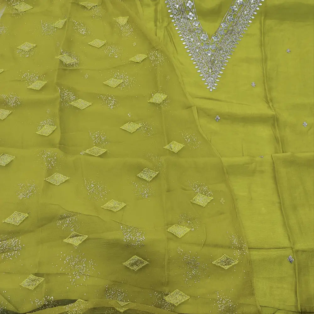 CODE JA252002: Bright mehandhi green pure dola silk unstitched salwar material v neck zari &sequins work on yoke&