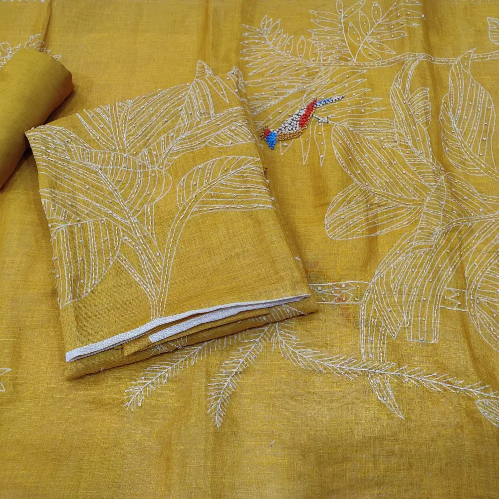 CODE JA252808: Mehandhi yellow with golden tint pure tissue linen unstitched salwar material rich hand embroidered