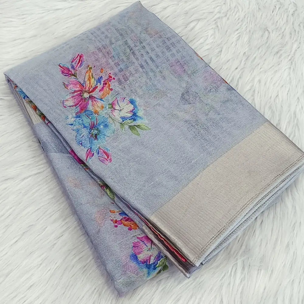 CODE WS1374: Light grey fancy super net saree printed all over fancy tassels on pallu printed blouse with border.