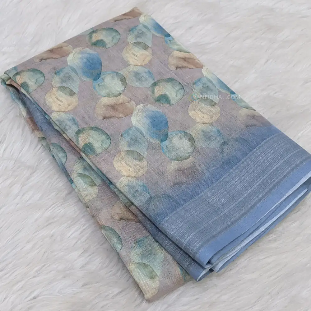CODE WS894: Pastel blue abstract printed soft fancy linen saree with double side silver tissue borders printed