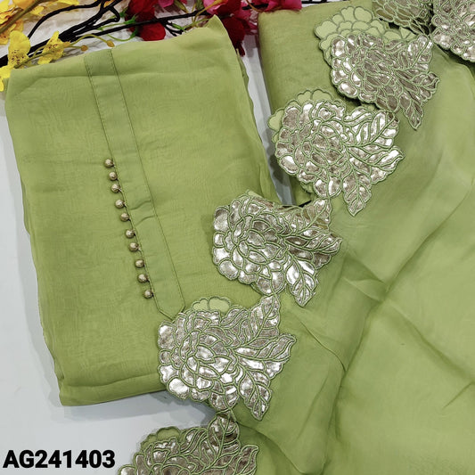 CODE AG241403 : Light green designer pure organza  unstitched salwar material, potli buttons on yoke(lining needed)rich leather cut work on daman, matching santoon bottom, short width pure organza dupatta with rich leather cut work.