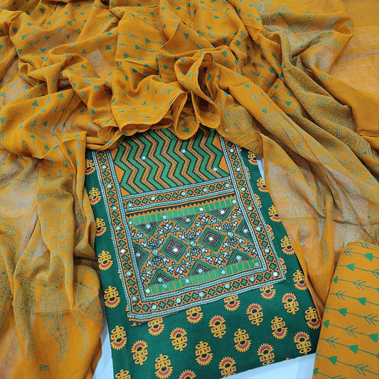 CODE DC240508 : Dark green block printed pure soft cotton unstitched salwar material, faux mirror work on yoke(lining optional)mehandhi yellow block printed cotton bottom, block printed soft mul cotton dupatta(REQUIRES TAPINGS).