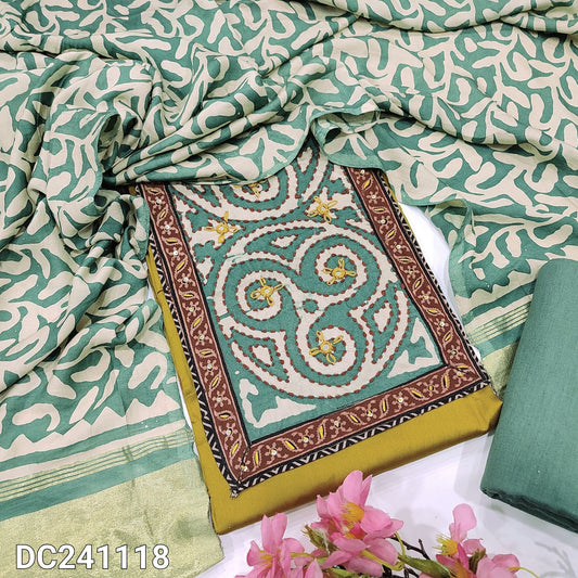 CODE DC241118 : Mehandhi yellow satin cotton unstitched salwar material, batik dyed yoke patch with thread& sequins work(lining optional)light teal green drum dyed pure cotton bottom, batik dyed premium soft silk cotton dupatta with gold tissue pallu.