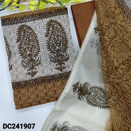 CODE DC241907 : Light brown schiffli embroidered fancy super net unstitched salwar material, block printed on yoke(netted fabric, lining needed)matching silk cotton bottom, block printed fancy super net dupatta with lace tapings.