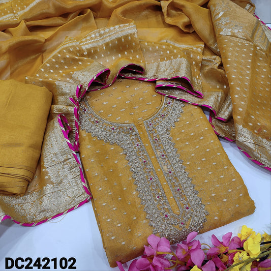 CODE DC242102 : Fenugreek yellow tissue silk unstitched salwar material, zari, zardozi& sequins work on yoke, zari buttas all over(thin fabric, lining needed)matching santoon bottom, tissue silk full length dupatta with zari buttas& border.