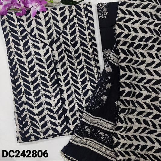 CODE DC242806 : White base black printed pure soft cotton unstitched salwar material, bead& faux mirror work on yoke(lining optional)printed cotton bottom, crinkled printed pure cotton dupatta with lace tapings.