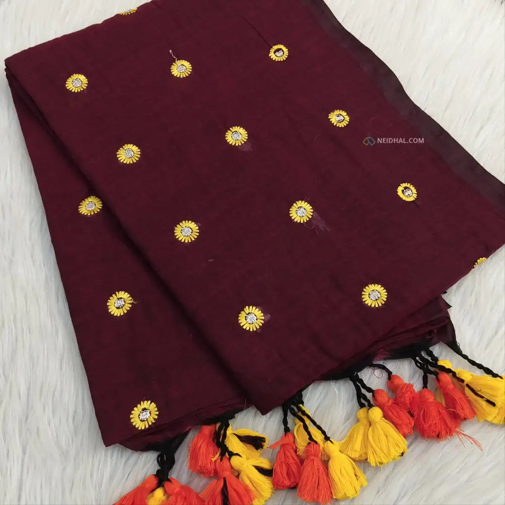 CODE NS02: Maroon pure mul cotton saree floral embroidered all over(thin& soft fabric)tassels on pallu plain running