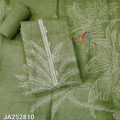 Pastel green linen fabric with white embroidered palm fronds and a small butterfly detail