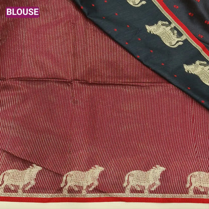 Black with maroon fancy silk cotton saree with thread woven buttas all over the body of the saree, double side borders with pichwai zari short pallu and zari striped blouse with cow motif weaving. CODE NS02