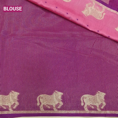 Pink with beetroot purple fancy silk cotton saree with thread woven buttas all over the body of the saree, double side borders with pichwai zari short pallu and zari striped blouse with cow motif weaving. CODE NS07