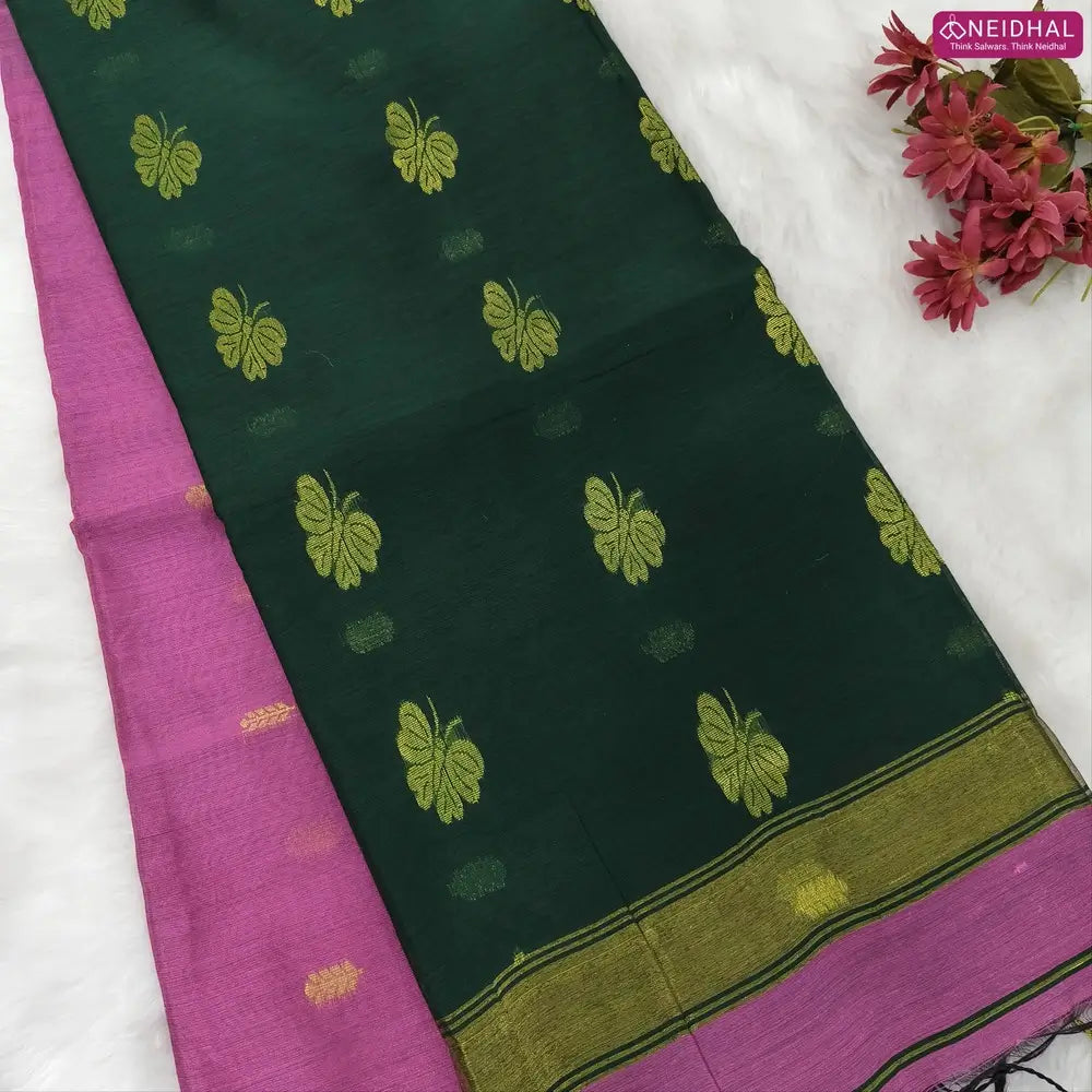 Lotus pink with bottle green Traditional zari woven silk cotton saree, double side borders, contrast thread woven pallu, thread woven running blouse with borders. NS17