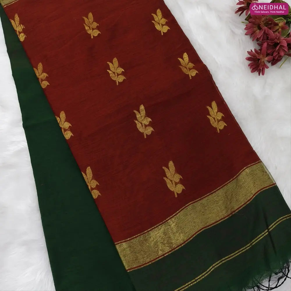 Bottle green with reddish maroon Traditional zari woven silk cotton saree, double side borders, contrast thread woven pallu, Plain running blouse with borders. NS16