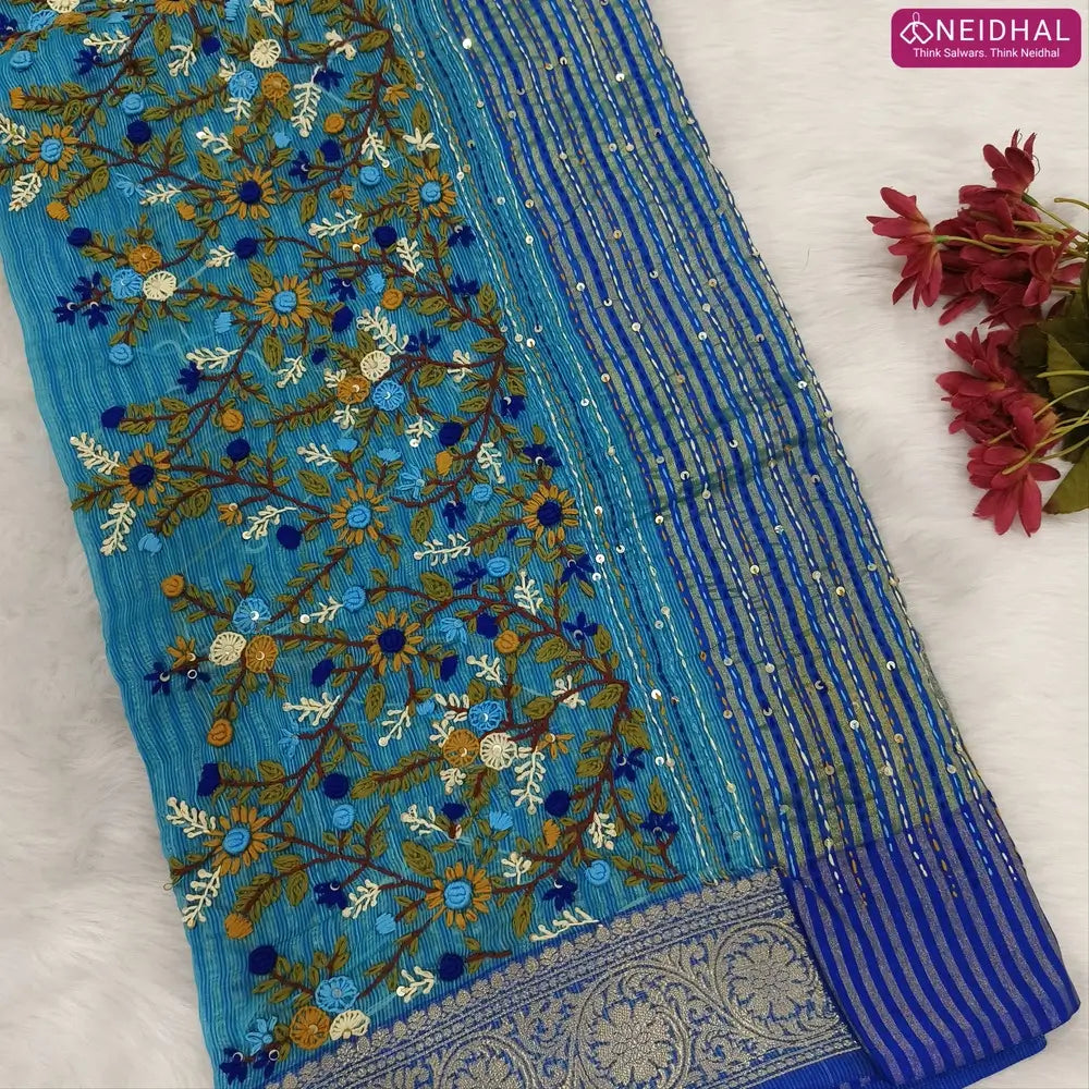 Designer turquoise Blue premium slub silk cotton saree, rich hand embroidery work on body and pallu, matching zari tissue striped blouse. NS09