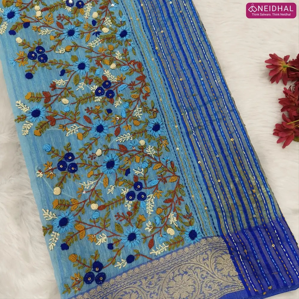 Designer sky blue premium slub silk cotton saree, rich hand embroidery work on body and pallu, matching zari tissue striped blouse. NS11