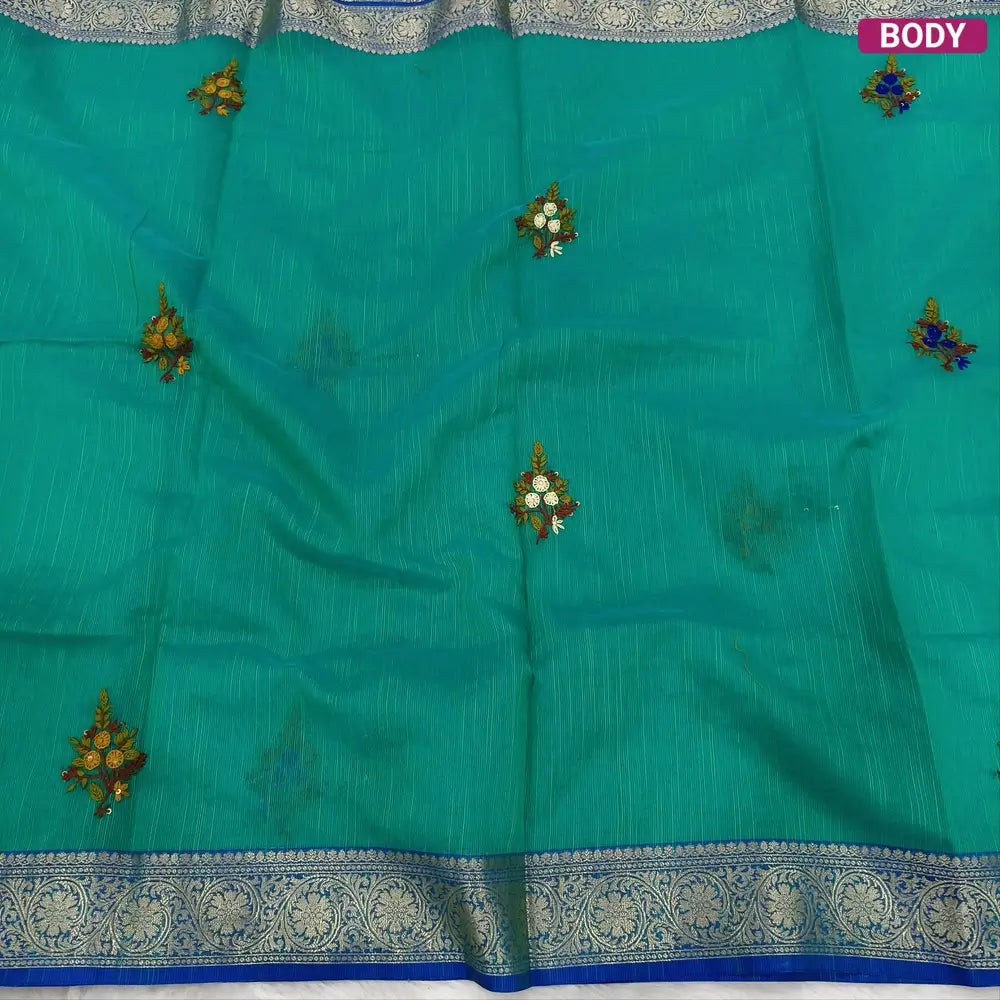 Designer Teal Green premium slub silk cotton saree, rich hand embroidery work on body and pallu, matching zari tissue striped blouse. NS15