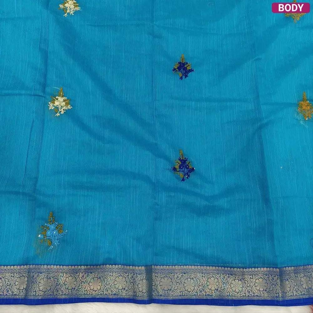 Designer turquoise Blue premium slub silk cotton saree, rich hand embroidery work on body and pallu, matching zari tissue striped blouse. NS09