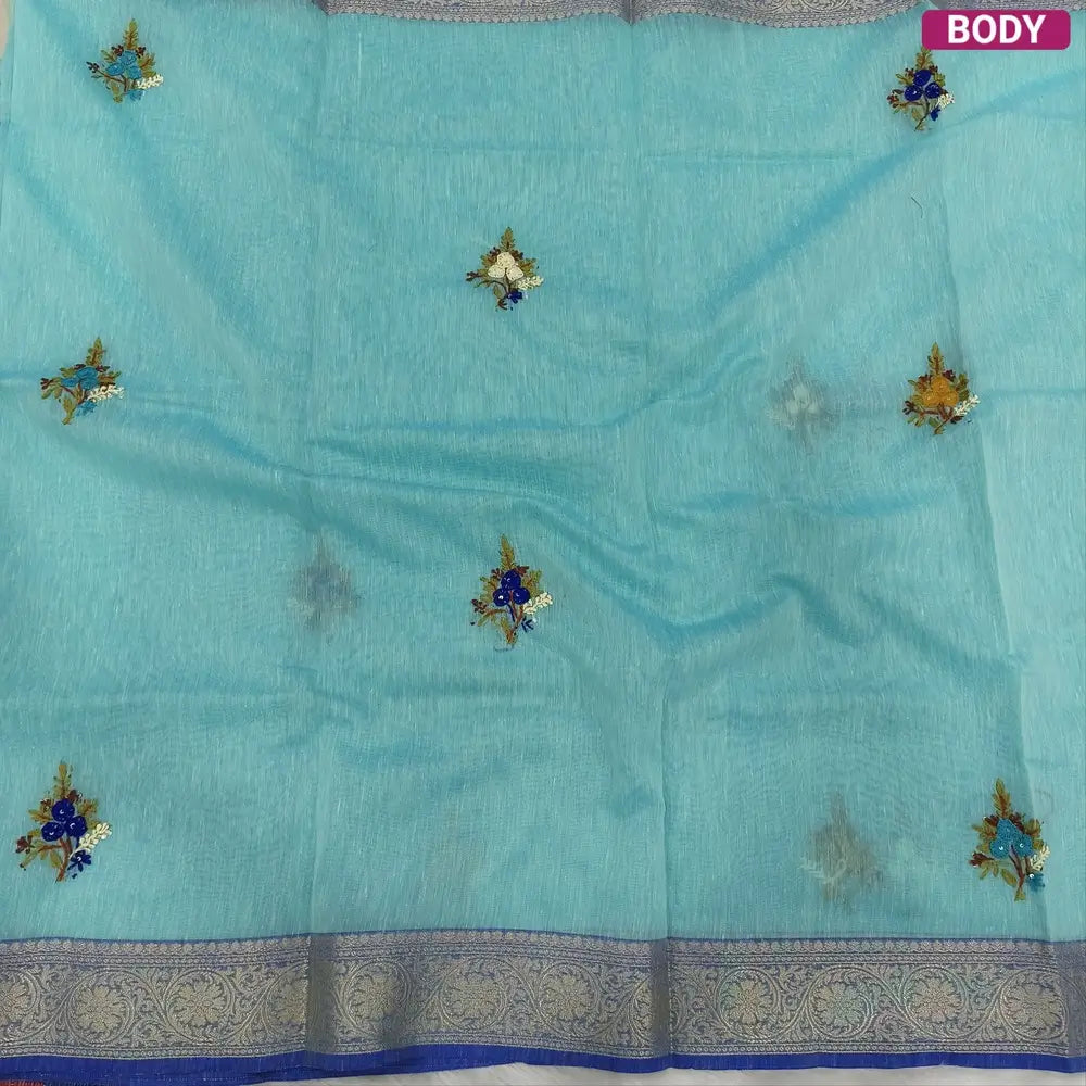 Designer Pastel blue premium slub silk cotton saree, rich hand embroidery work on body and pallu, matching zari tissue striped blouse. NS13