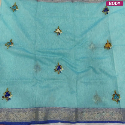 Designer Pastel blue premium slub silk cotton saree, rich hand embroidery work on body and pallu, matching zari tissue striped blouse. NS13