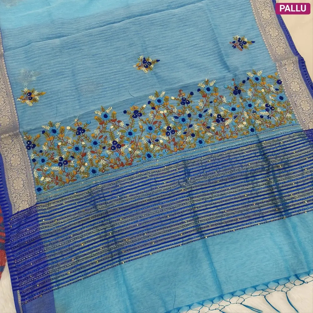 Designer sky blue premium slub silk cotton saree, rich hand embroidery work on body and pallu, matching zari tissue striped blouse. NS11
