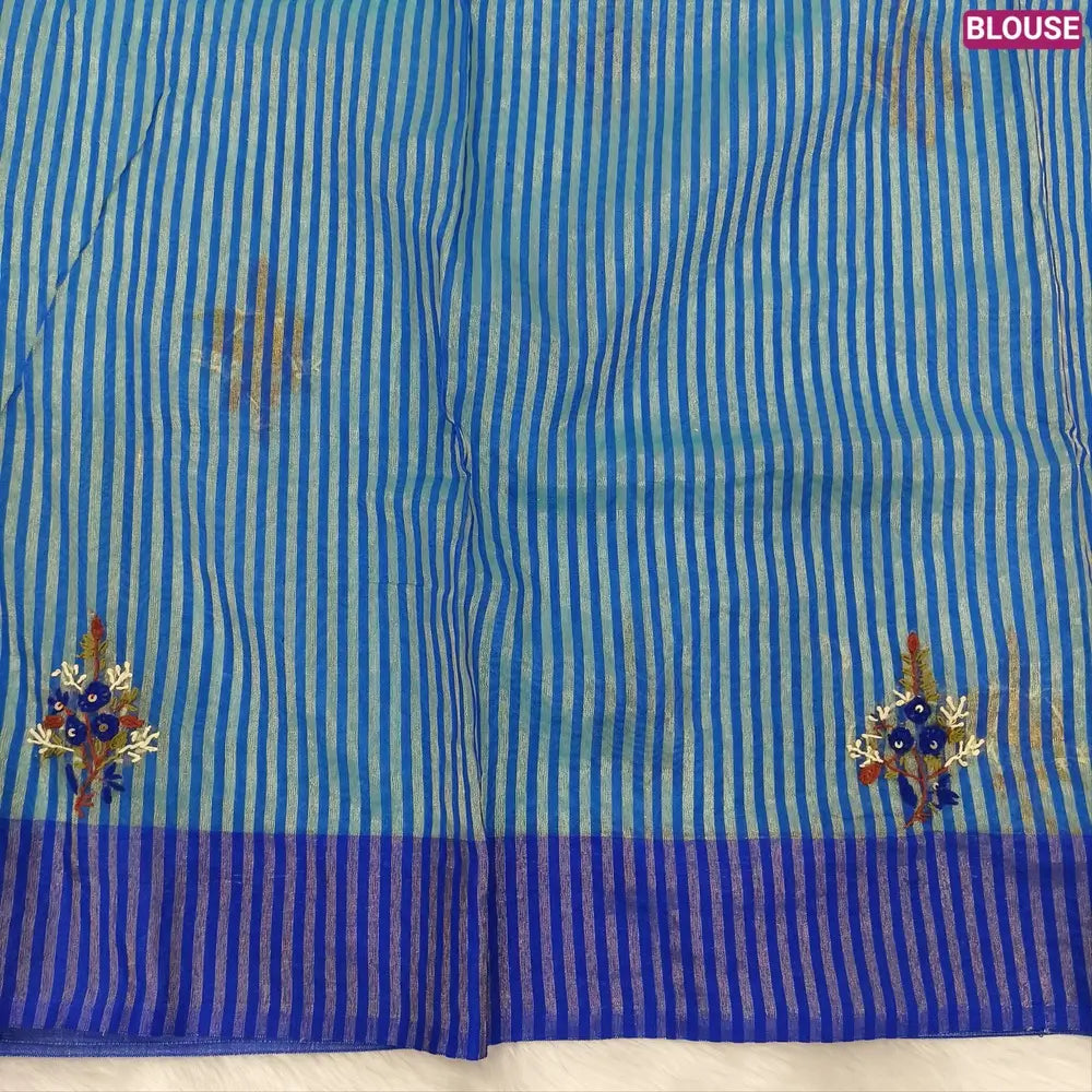 Designer Pastel blue premium slub silk cotton saree, rich hand embroidery work on body and pallu, matching zari tissue striped blouse. NS13