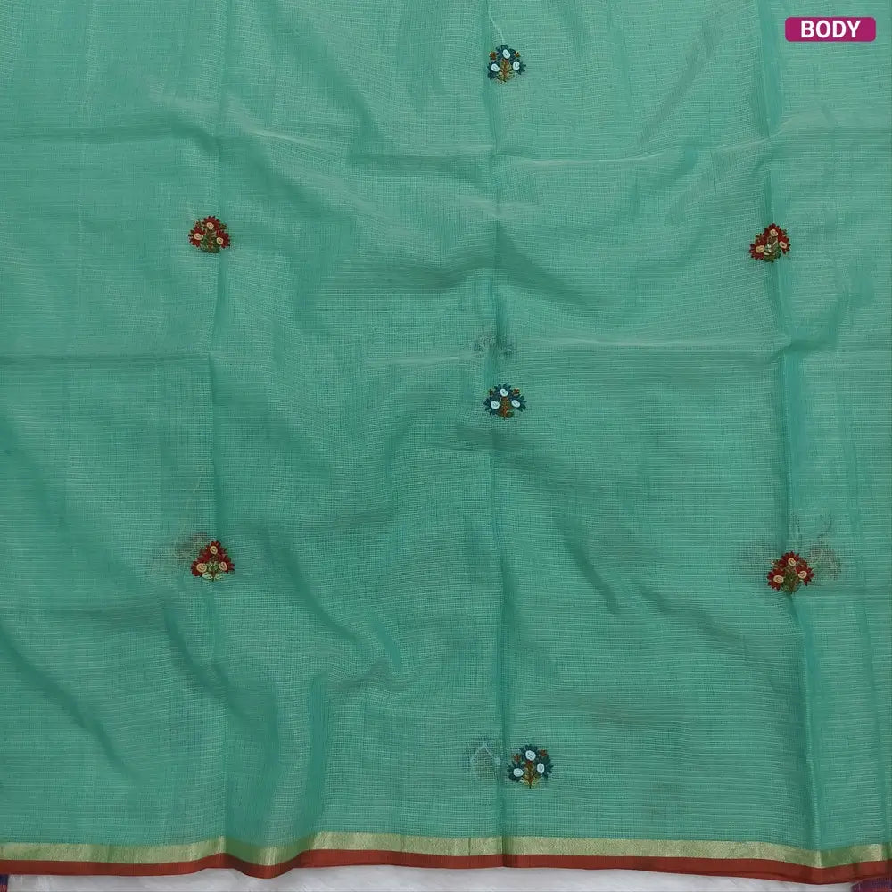 Sea green Premium kota silk cotton embroidered saree (lightweight, thin, soft), double side thin tissue borders, heavy embroidered pallu with tissue stripes, blouse with embroidery. NS32