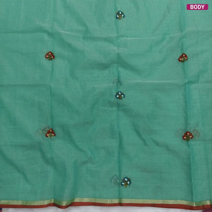 Sea green Premium kota silk cotton embroidered saree (lightweight, thin, soft), double side thin tissue borders, heavy embroidered pallu with tissue stripes, blouse with embroidery. NS32