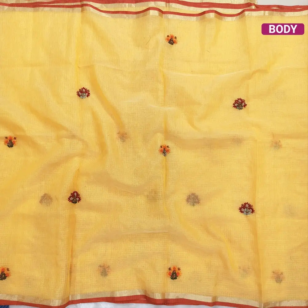 Yellow Premium kota silk cotton embroidered saree (lightweight, thin, soft), double side thin tissue borders, heavy embroidered pallu with tissue stripes, blouse with embroidery. NS27