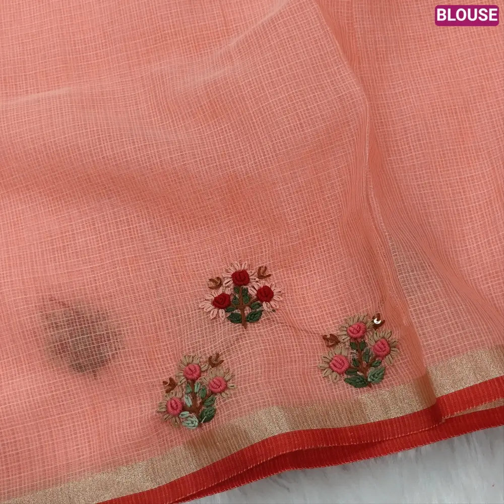 Pastel Peach Premium kota silk cotton embroidered saree (lightweight, thin, soft), double side thin tissue borders, heavy embroidered pallu with tissue stripes, blouse with embroidery. NS26