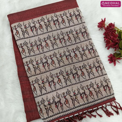 Dark Maroon semi linen saree(thin& light weight) warli print& silver tissue on borders, warli printed pallu with tassels, plain running blouse with silver tissue borders. NS34