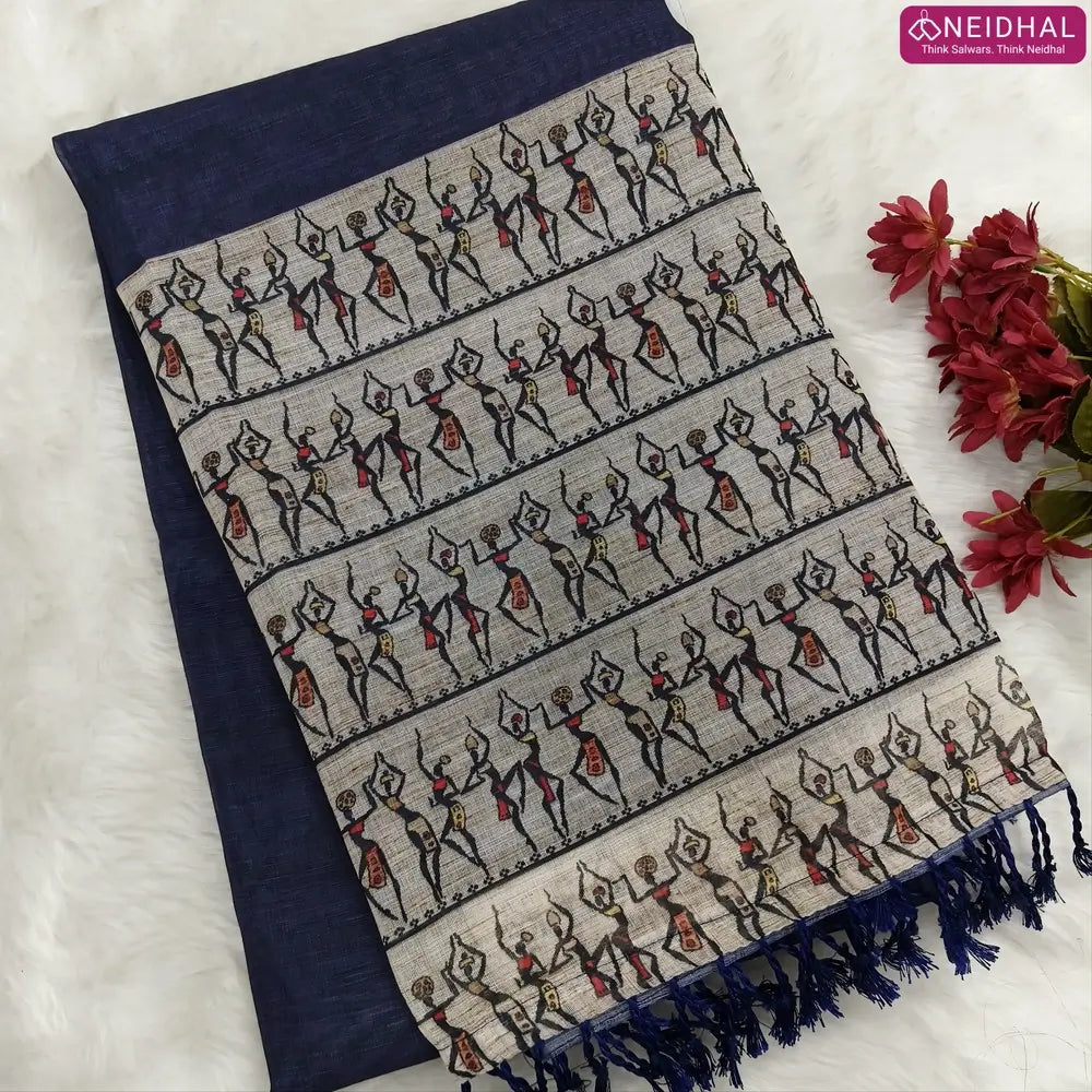 Dark Blue semi linen saree(thin& light weight)warli print& silver tissue on borders, warli printed pallu with tassels, plain running blouse with silver tissue borders. NS33