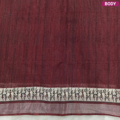 Dark Maroon semi linen saree(thin& light weight) warli print& silver tissue on borders, warli printed pallu with tassels, plain running blouse with silver tissue borders. NS34