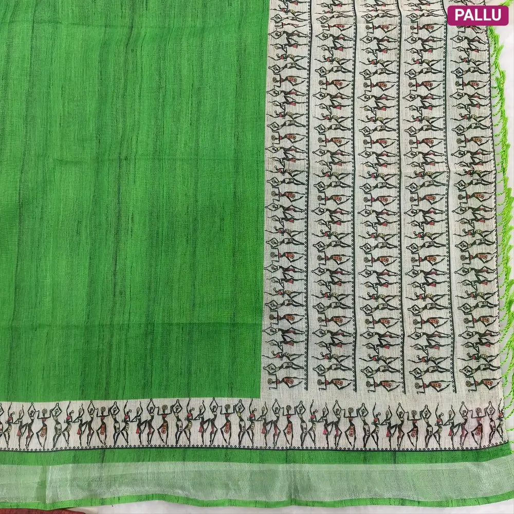 Parrot Green semi linen saree(thin& light weight) warli print& silver tissue on borders, warli printed pallu with tassels, plain running blouse with silver tissue borders. NS35