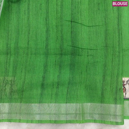 Parrot Green semi linen saree(thin& light weight) warli print& silver tissue on borders, warli printed pallu with tassels, plain running blouse with silver tissue borders. NS35