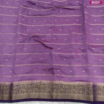 Lilac fancy silk saree (soft, silky) with banarasi zari woven double side borders zari woven butttas and stripes allover, contrast zari woven pallu, dark purple zari woven blouse with borders. NS42