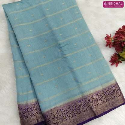 Pastel Blue fancy silk saree (soft, silky) with banarasi zari woven double side borders zari woven butttas and stripes allover, contrast zari woven pallu, dark purple zari woven blouse with borders. NS41