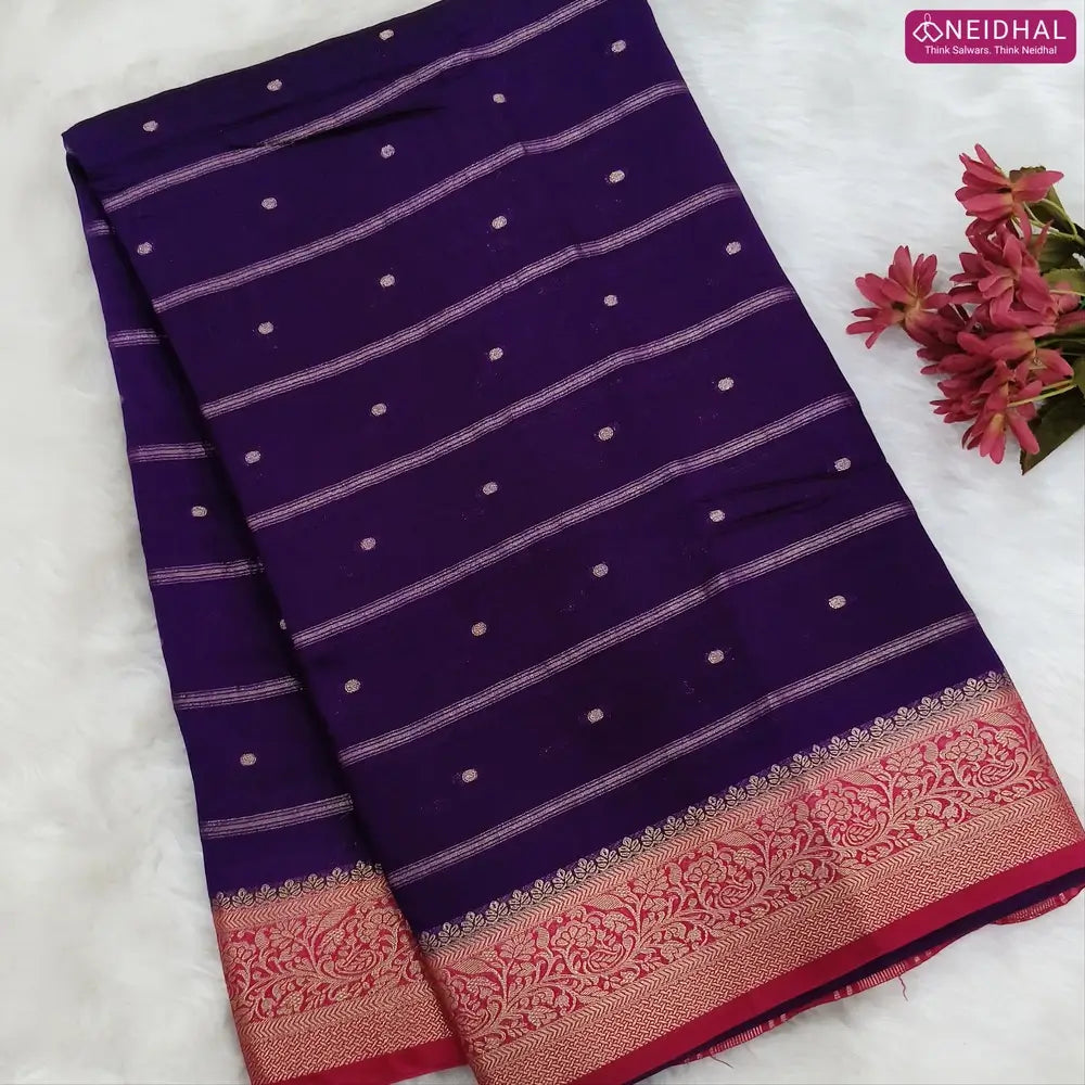 Dark Purple fancy silk saree (soft, silky) with banarasi zari woven double side borders zari woven butttas and stripes allover, contrast zari woven pallu, dark pink zari woven blouse with borders. NS40