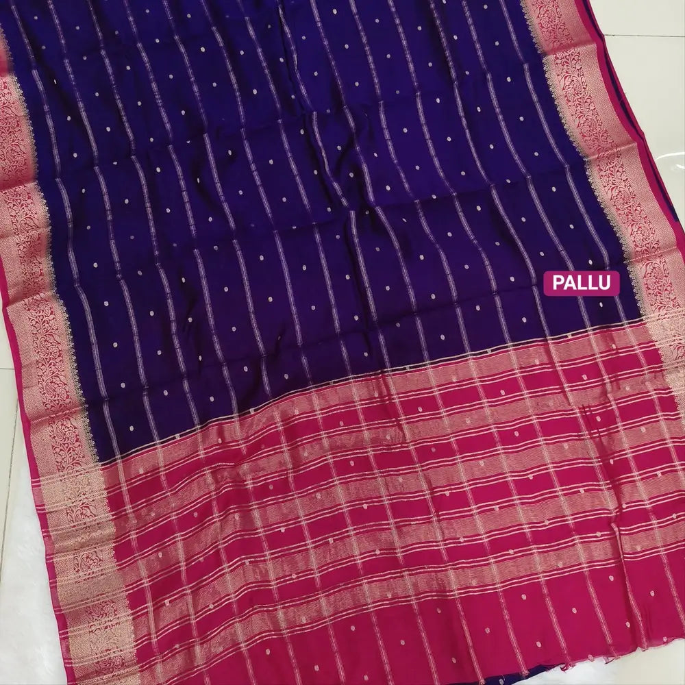 Dark Purple fancy silk saree (soft, silky) with banarasi zari woven double side borders zari woven butttas and stripes allover, contrast zari woven pallu, dark pink zari woven blouse with borders. NS40