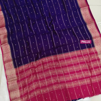 Dark Purple fancy silk saree (soft, silky) with banarasi zari woven double side borders zari woven butttas and stripes allover, contrast zari woven pallu, dark pink zari woven blouse with borders. NS40
