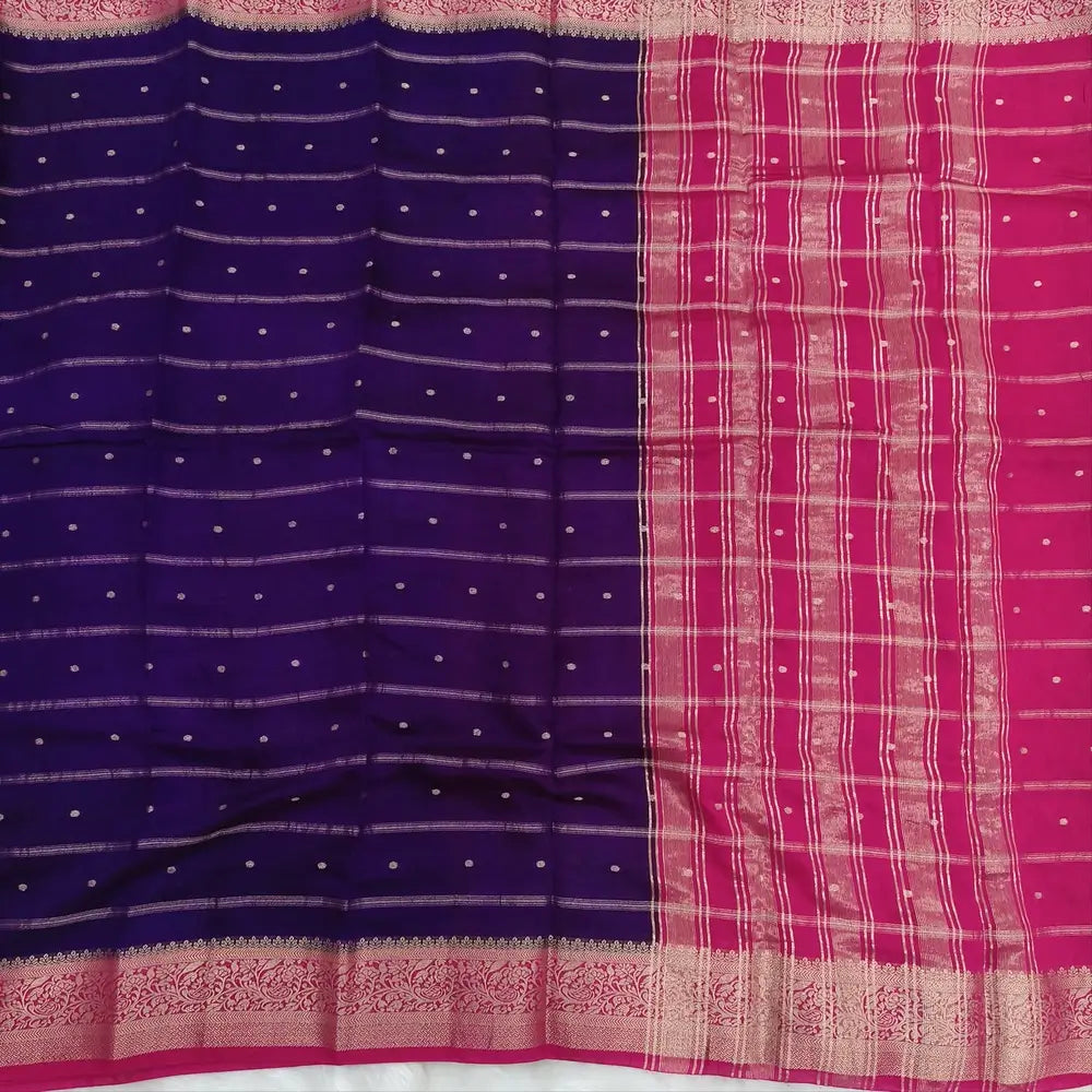 Dark Purple fancy silk saree (soft, silky) with banarasi zari woven double side borders zari woven butttas and stripes allover, contrast zari woven pallu, dark pink zari woven blouse with borders. NS40