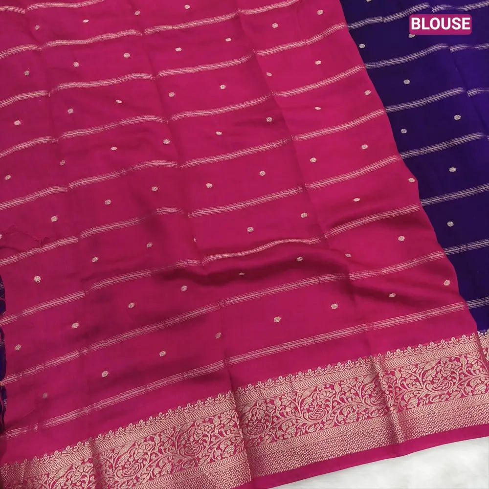 Dark Purple fancy silk saree (soft, silky) with banarasi zari woven double side borders zari woven butttas and stripes allover, contrast zari woven pallu, dark pink zari woven blouse with borders. NS40