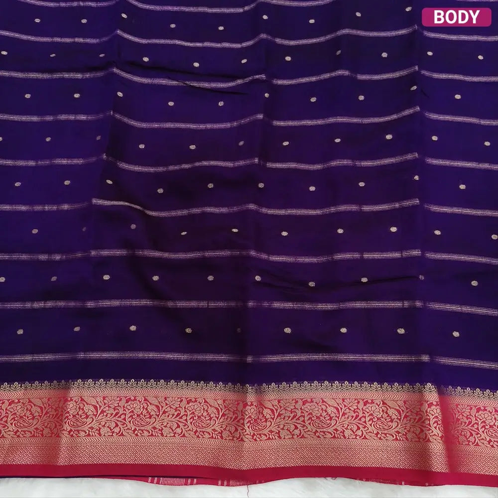 Dark Purple fancy silk saree (soft, silky) with banarasi zari woven double side borders zari woven butttas and stripes allover, contrast zari woven pallu, dark pink zari woven blouse with borders. NS40