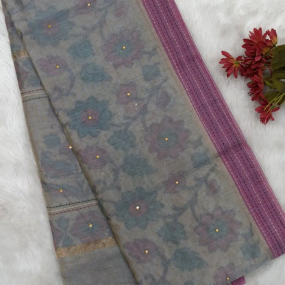Light grey with golden tint printed soft silk cotton saree (lightweight, thin, soft) double side borders with kantha stitch detailing, printed pallu with thread embroidery and simple tassels, plain running blouse with borders. NS52
