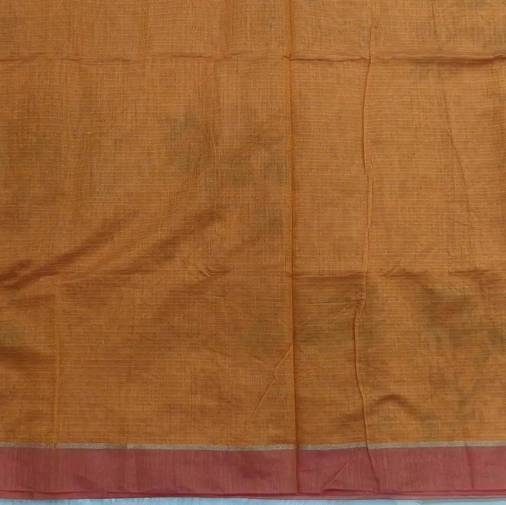 Light orange with golden tint printed soft silk cotton saree (lightweight, thin, soft) double side borders with kantha stitch detailing, printed pallu with thread embroidery and simple tassels, plain running blouse with borders. NS49