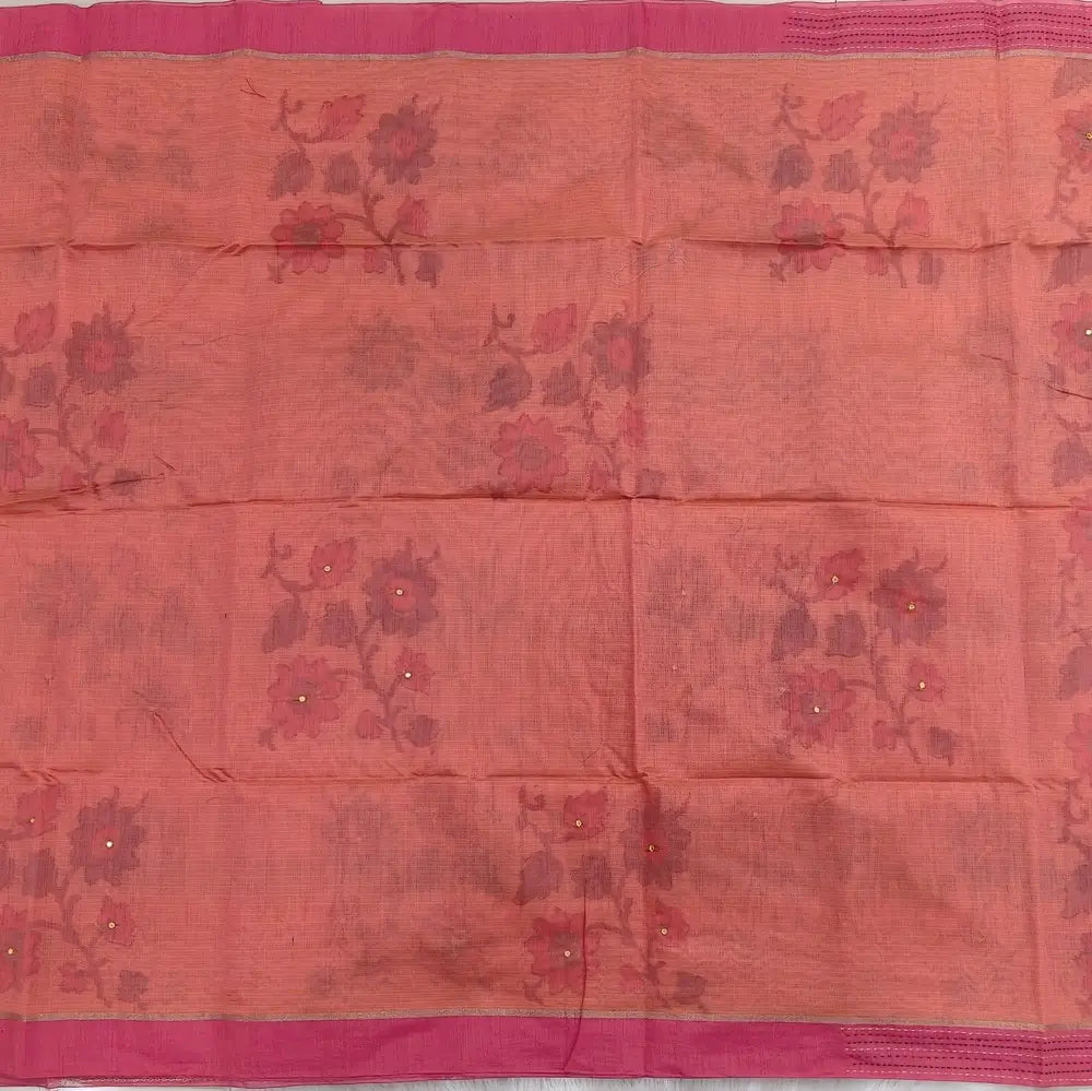 Light peachish pink with golden tint printed soft silk cotton saree (lightweight, thin, soft) double side borders with kantha stitch detailing, printed pallu with thread embroidery and simple tassels, plain running blouse with borders. NS50