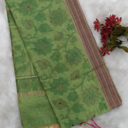 Pastel green with golden tint printed soft silk cotton saree (lightweight, thin, soft) double side borders with kantha stitch detailing, printed pallu with thread embroidery and simple tassels, plain running blouse with borders. NS51