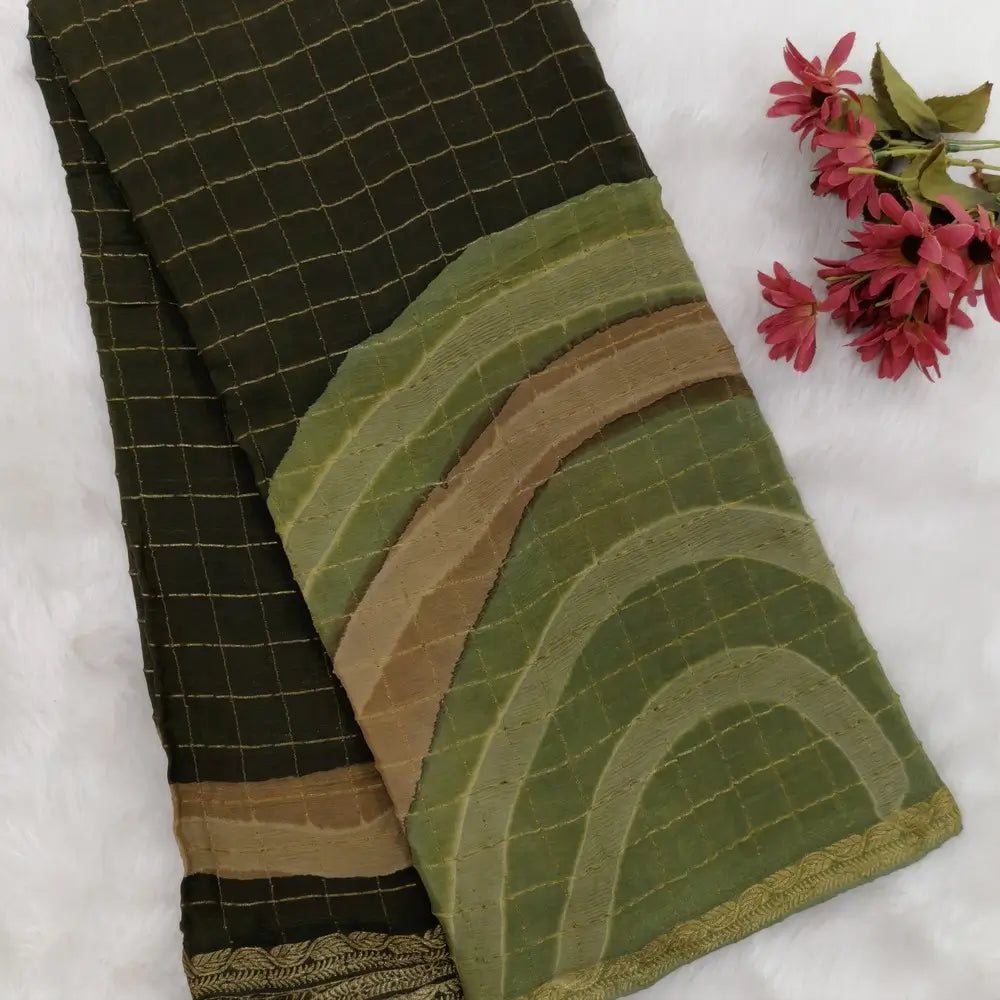 Dark Olive Green Viscous Chanderi silk saree with shibori prints all over and zari checks all over, thin zari woven borders and running viscous chanderi zari woven blouse. NS57