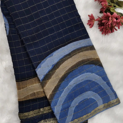 Dark Blue Viscous Chanderi silk saree with shibori prints all over and zari checks all over, thin zari woven borders and running viscous chanderi zari woven blouse. NS59