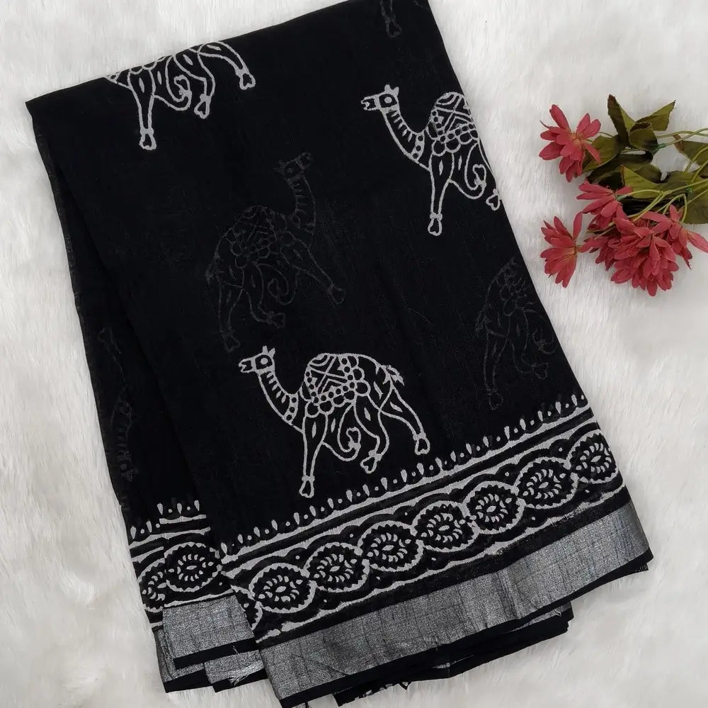 Black block printed linen cotton saree with double side silver zari borders (lightweight,soft) printed pallu with silver zari stripes, plain running blouse with borders. NS62